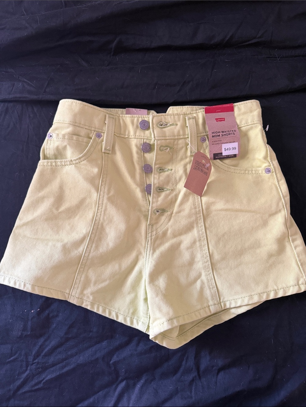 Levi's High-Waist Button-Fly Shorts in Light Yellow